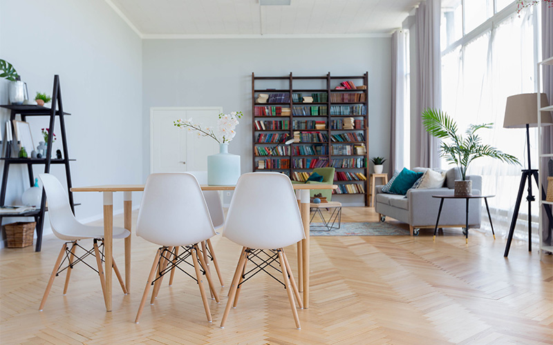 Bright living and dining room with modern decor.